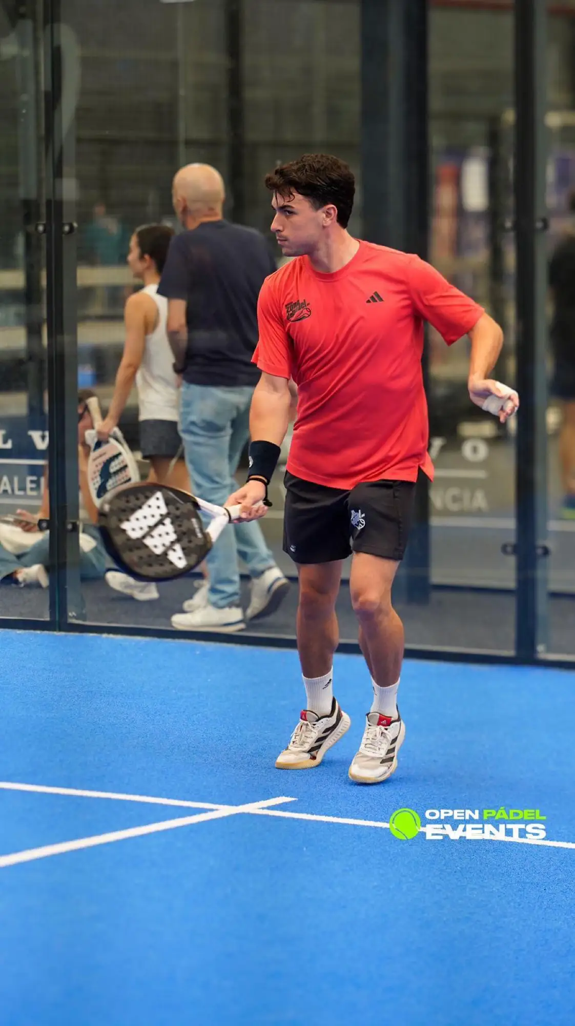 Player at the net during a padel point